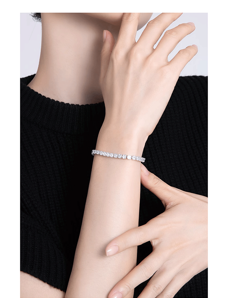 3.5 CTW colorless round brilliant cut moissanite tennis bracelet in adjustable bolo style set in 925 sterling silver worn on wrist