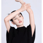 5 CTW DEW colorless round brilliant cut moissanites tennis bolo bracelet in sterling silver on model's wrist