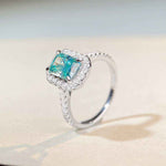 1.8 CTW DEW radiant cut Paraíba mint green moissanite halo engagement ring in sterling silver with pavé cubic zirconia band