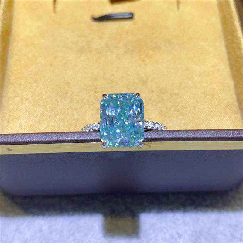 1.8 CTW DEW radiant cut blue green moissanite solitaire engagement ring in sterling silver with pavé accents