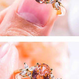 2.1 CTW DEW Oval Cut Pink Moissanite Three Stone Engagement Ring with