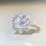 2.4 CTW DEW cushion cut colorless moissanite sunflower halo engagement ring in sterling silver