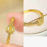 18K yellow gold twisted ring with square cube sugar zircon gem and polished finish