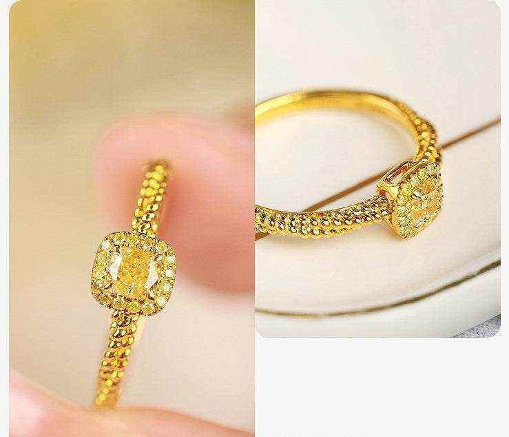 18K yellow gold twisted ring with square cube sugar zircon gem and polished finish