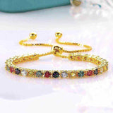 2.3 CTW multi-color round brilliant cut moissanite tennis bracelet in adjustable yellow gold plated 925 sterling silver bolo style