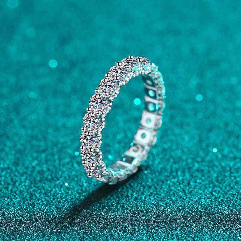 2.1 CTW DEW full round moissanite eternity wedding band in platinum plated sterling silver with brilliant round-cut stones