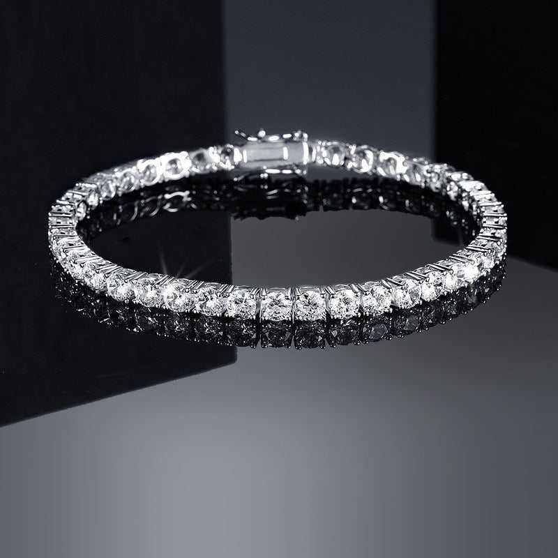 4.6-17.5 CTW colorless round brilliant cut moissanite tennis bracelet in 925 sterling silver chain with box clasp on reflective black surface