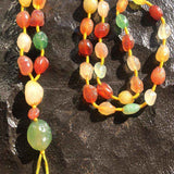 Colorful natural Alashan Gobi Desert Candy Agate necklace with multi-color rough chalcedony beads on yellow rope strand and pendant