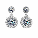 Pair of 1 CTW DEW colorless round cut moissanite halo drop earrings in 925 sterling silver with 18K gold plating and push back studs