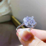 4.75 CTW DEW colorless round brilliant cut moissanite halo engagement ring in sterling silver