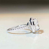 5 CTW colorless cushion cut moissanite engagement ring with crushed ice cut, sterling silver pavé halo setting
