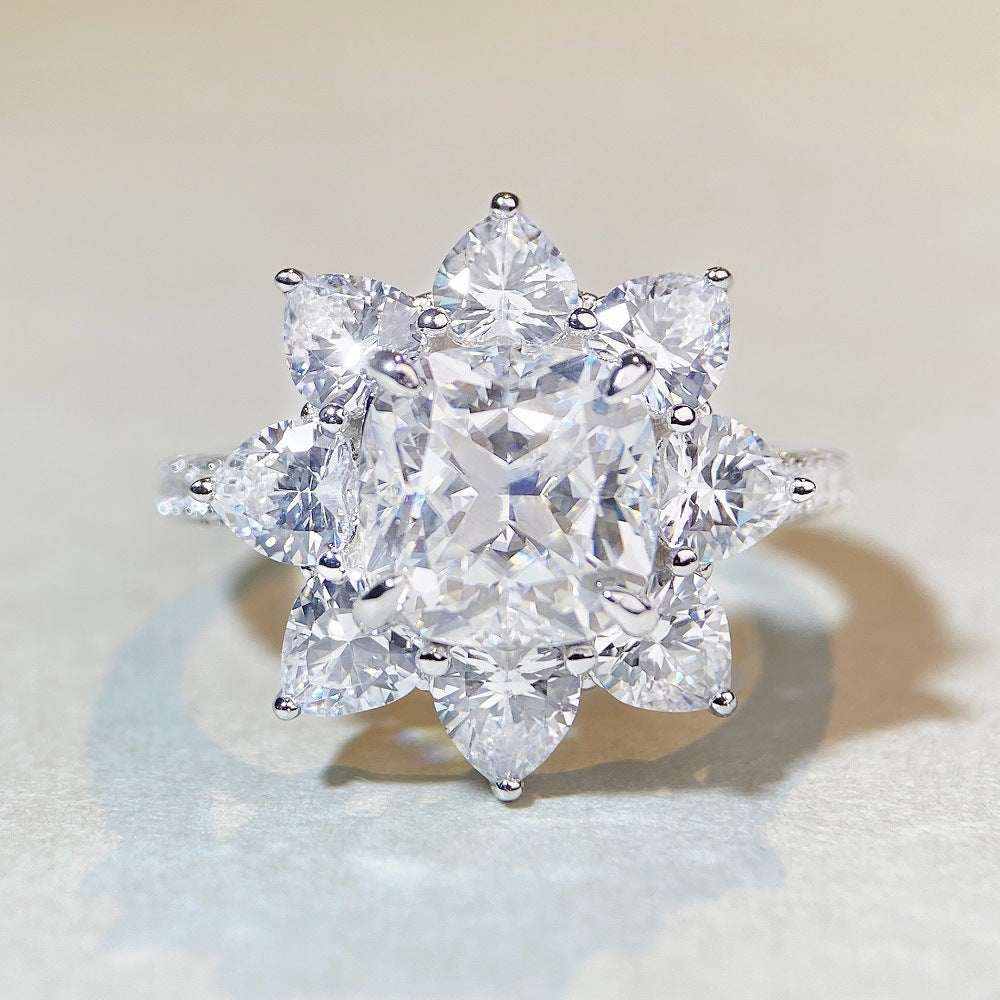 2.4 CTW DEW colorless cushion cut moissanite sunflower halo engagement ring in sterling silver with pavé cubic zirconia accents