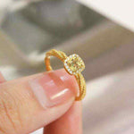 18K yellow gold twisted ring with square cube sugar zircon gemstone and polished finish