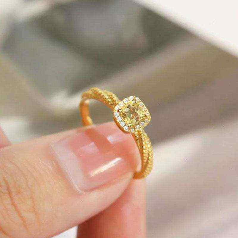18K yellow gold twisted ring with square cube sugar zircon gemstone and polished finish