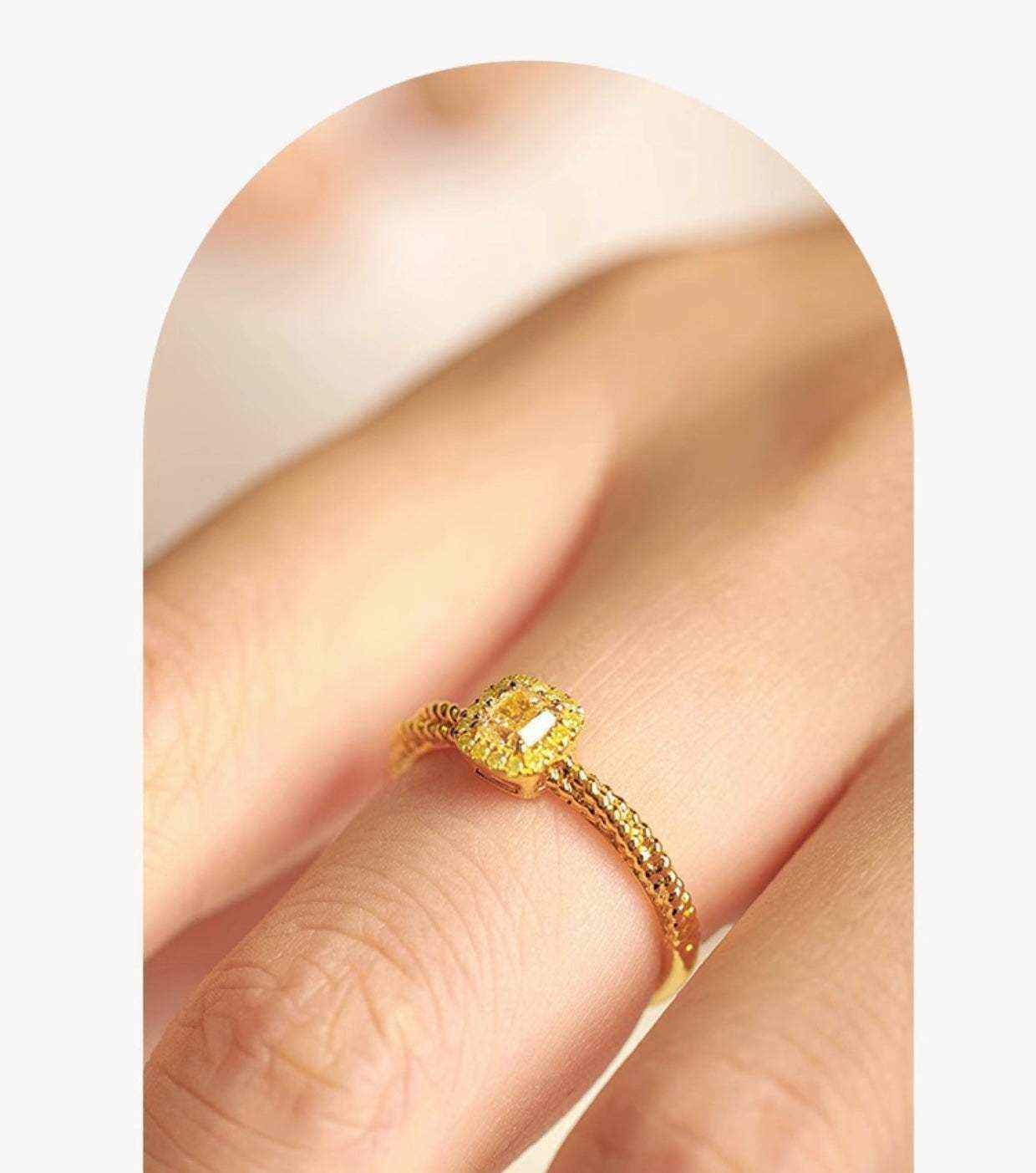 18K yellow gold cube sugar square gem dough twisted ring on finger with polished finish and zircon stone