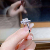 2.4 CTW DEW colorless cushion cut moissanite sunflower halo engagement ring in sterling silver