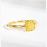 18K yellow gold twisted band ring with square cube sugar zircon gem