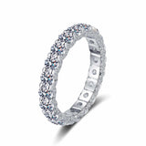 2.1 CTW DEW full round moissanite eternity wedding band in platinum plated sterling silver