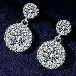Pair of 1 CTW DEW colorless round cut moissanite halo drop earrings in 925 sterling silver with 18K gold plating and butterfly push back clasps