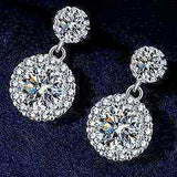 Pair of 1 CTW DEW colorless round cut moissanite halo drop earrings in 925 sterling silver with 18K gold plating and butterfly push back clasps