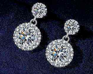 Pair of 1 CTW DEW colorless round cut moissanite halo drop earrings in 925 sterling silver with 18K gold plating and butterfly push back clasps