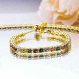 2.3 CTW multicolor round brilliant cut moissanite tennis bolo bracelet in yellow gold plated 925 sterling silver with adjustable sliding clasp