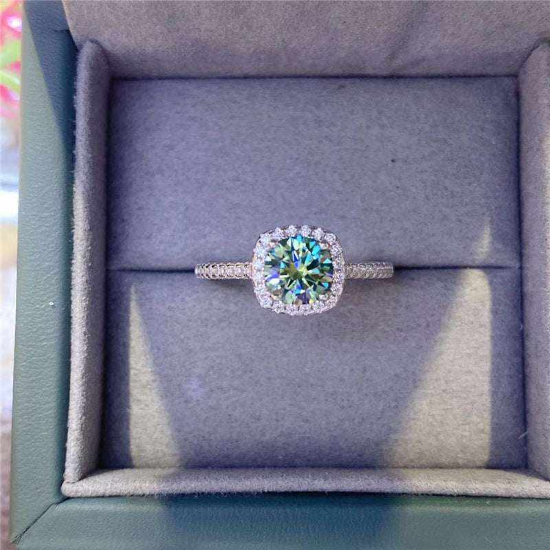 2.7 CTW DEW green moissanite halo engagement ring in sterling silver with pavé diamonds