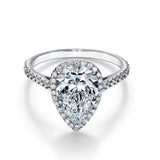2.1 CTW colorless pear cut moissanite halo engagement ring in sterling silver with pavé accents
