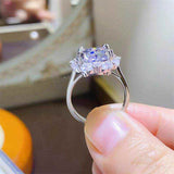 4.75 CTW DEW round brilliant cut moissanite halo engagement ring in sterling silver