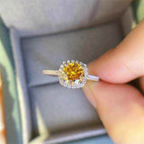 1 CTW DEW round brilliant cut yellow moissanite engagement ring with sterling silver cushion outline pavé halo setting