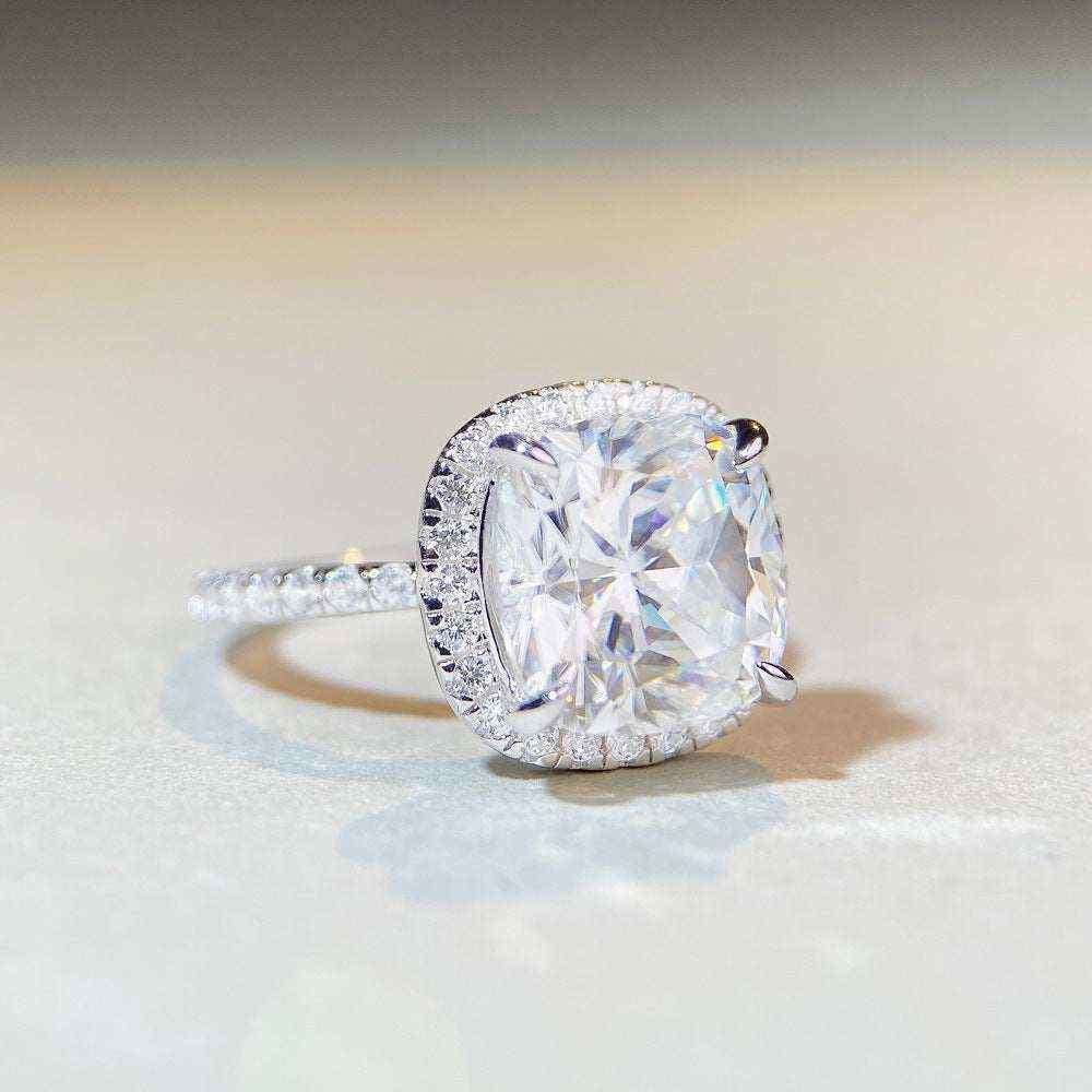 5 CTW colorless cushion cut moissanite halo engagement ring in sterling silver with pavé cubic zirconia accents