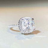 5 CTW colorless cushion cut moissanite halo engagement ring in sterling silver with pavé cubic zirconia accents