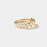 Highland Oval cut diamond bezel set half eternity ring in 14k solid gold