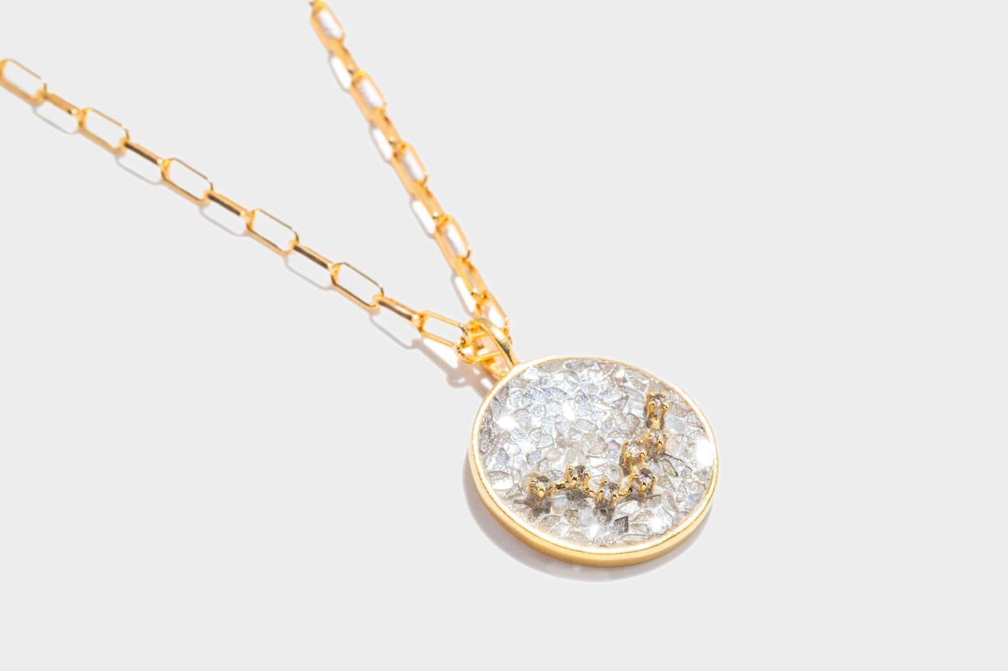 Pisces gold vermeil pendant necklace with raw diamonds and white resin on an 18k gold chain