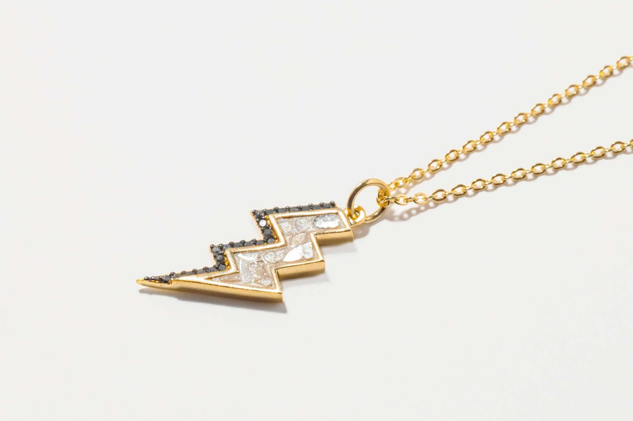 Rishi Bolt Diamond gold vermeil pendant necklace with raw and pave diamonds on a delicate gold chain
