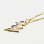 Rishi Bolt Diamond gold vermeil pendant necklace with raw and pave diamonds on a delicate gold chain