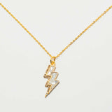 Rishi Bolt Diamond gold vermeil lightning bolt pendant necklace with pavé and raw diamonds on 18K gold chain