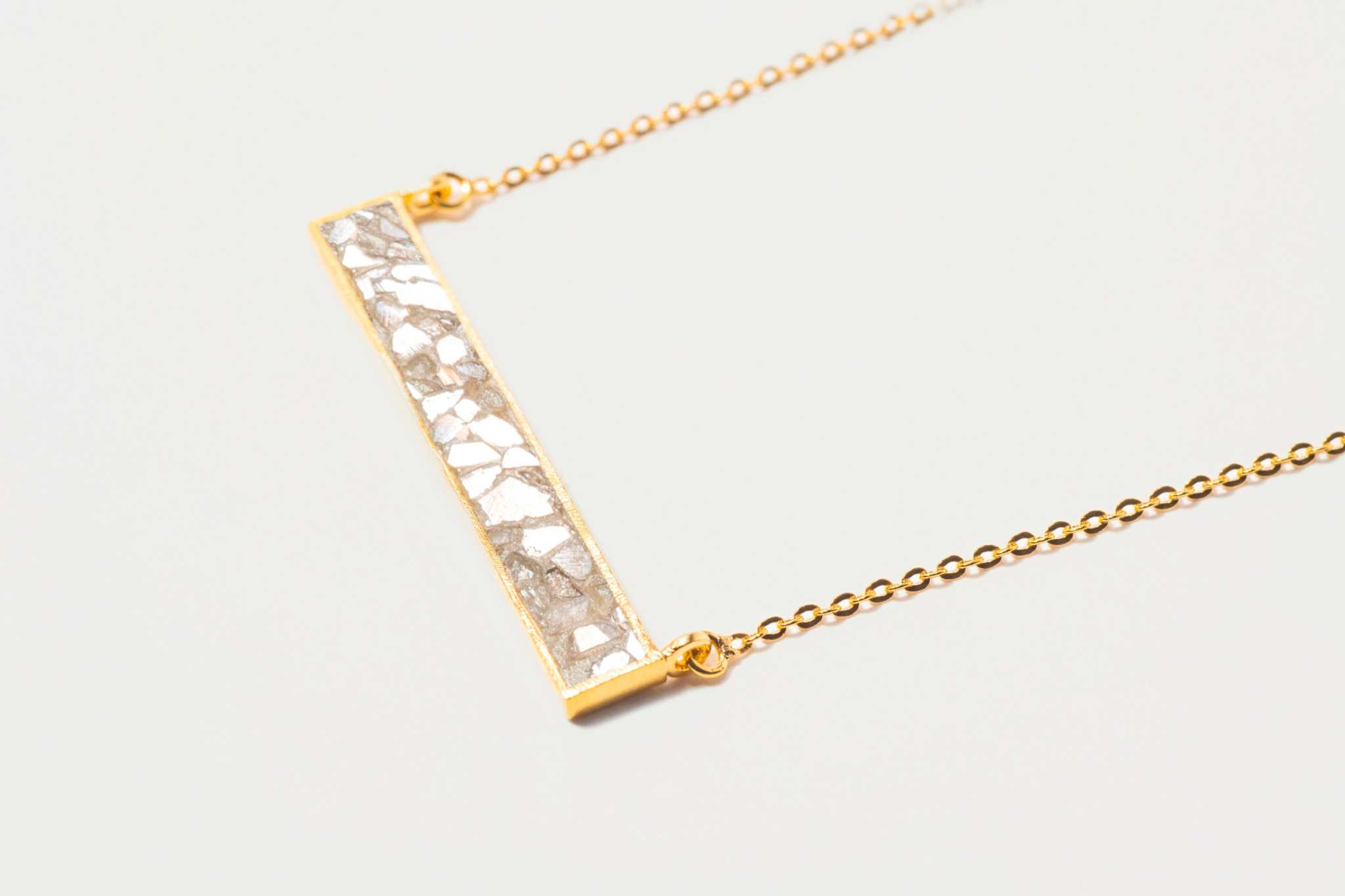Rosera Gold Vermeil pendant necklace with sliced raw uncut diamonds and 18k gold vermeil bar design on gold chain