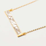 Rosera Gold Vermeil pendant necklace with sliced raw uncut diamonds and 18k gold vermeil bar design on gold chain