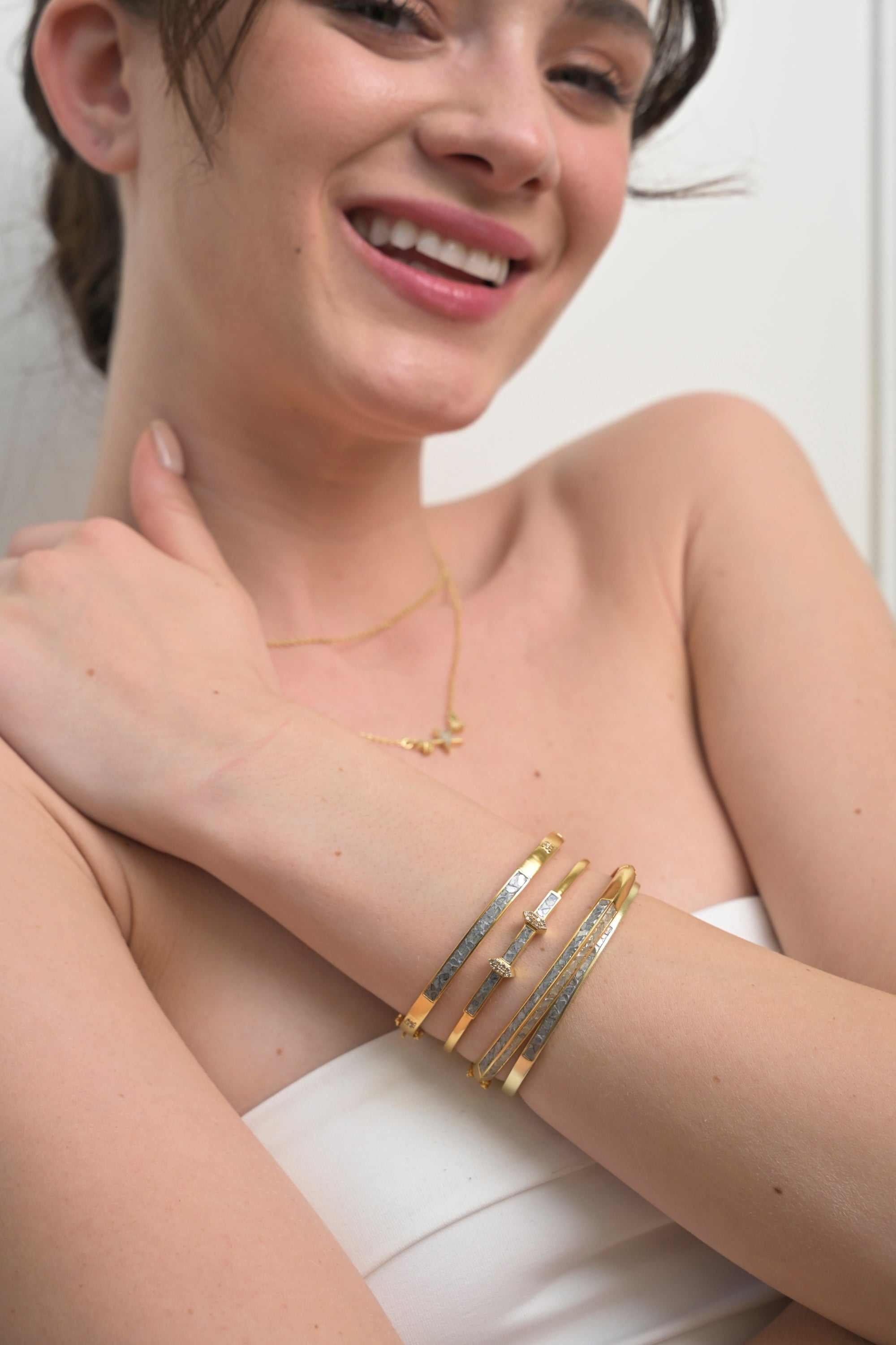 Sasta Gold Vermeil bangle bracelet with sliced raw diamonds and sterling silver base worn on wrist