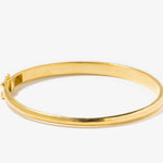 Sasta Gold Vermeil simple stackable 18k gold layered bangle bracelet on white background
