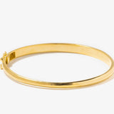 Sasta Gold Vermeil simple stackable 18k gold layered bangle bracelet on white background