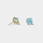 Cushion cut sky blue topaz stud earrings set in 14k gold, handcrafted in the USA, inspired by coastal New Hampshire.