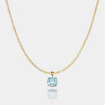 14k gold necklace with AAA-quality sky blue topaz pendant in custom basket setting