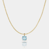 14k gold necklace with AAA-quality sky blue topaz pendant in custom basket setting