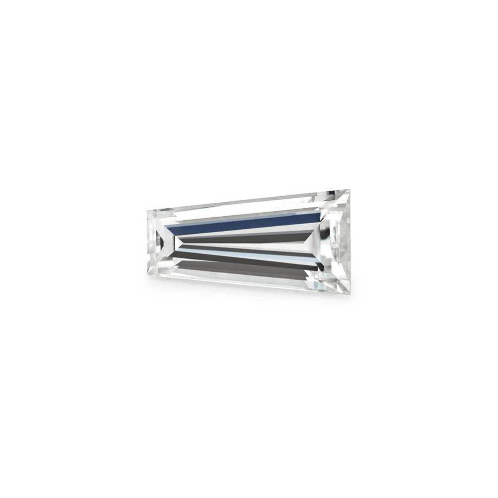 Charles & Colvard Forever One™ tapered baguette shape moissanite gemstone, clear and faceted, high-quality IF-VS1 grade.