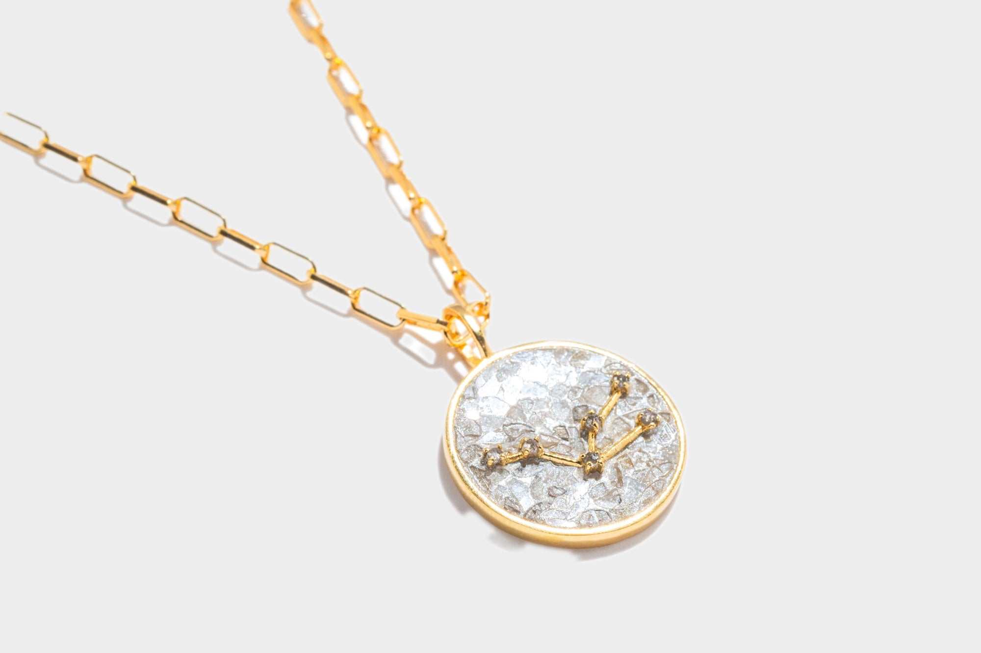 Taurus Gold vermeil pendant necklace with diamond constellation design on an 18k gold chain