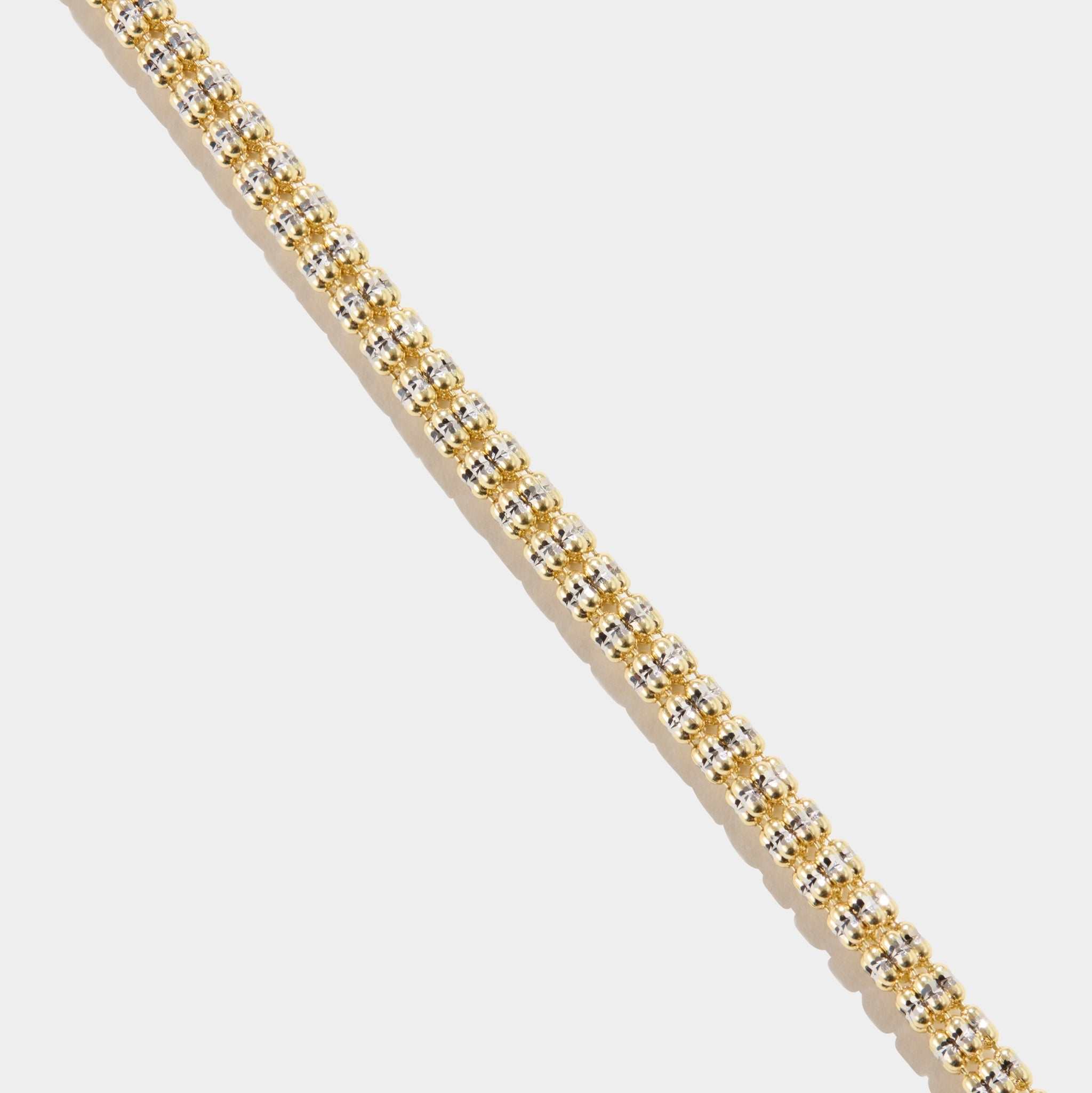 Tidal Tennis 14K Gold Bracelet with diamond cut design in polished yellow gold by Cleo & Me Fine Jewelry