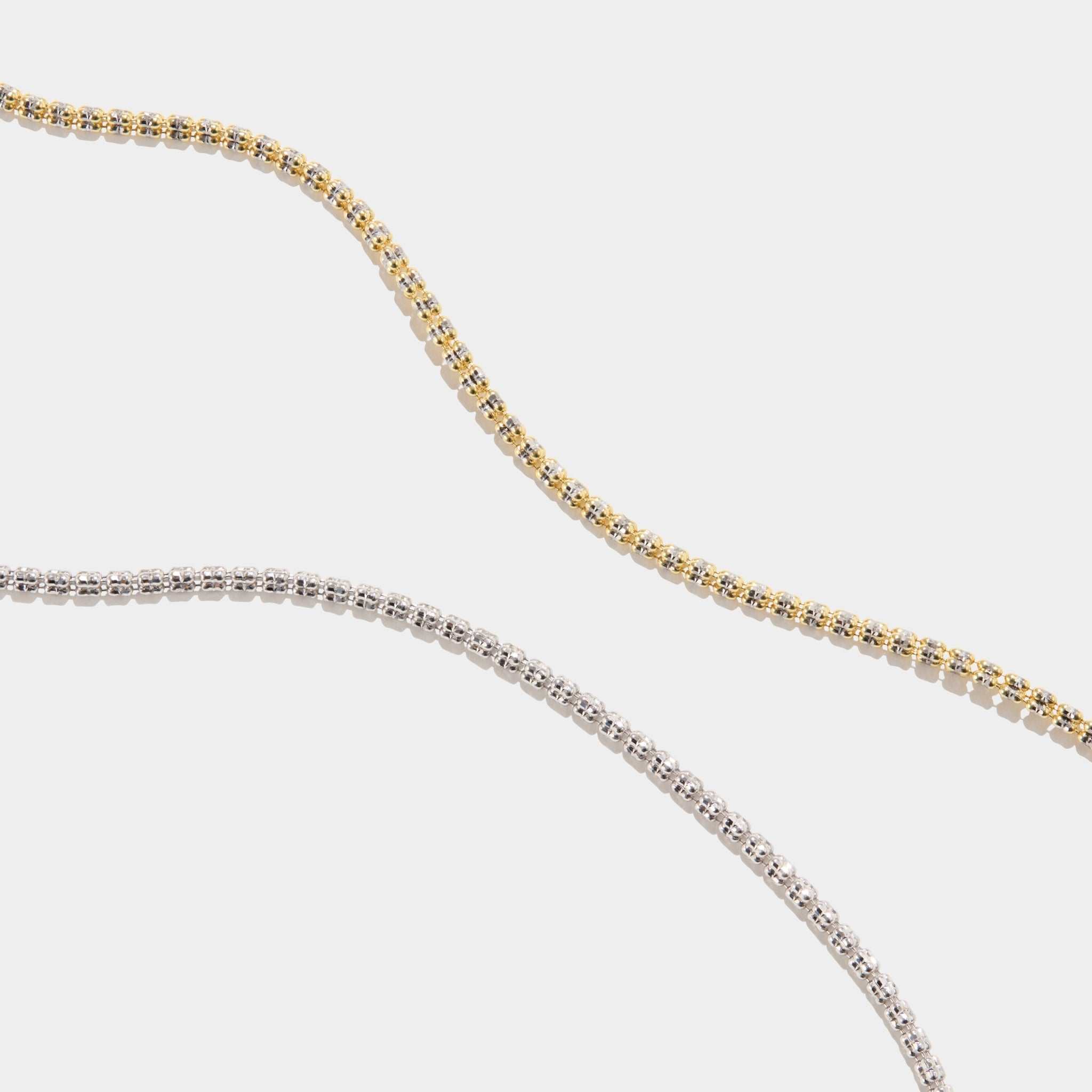 Tidal Tennis 14K Gold Bracelets in yellow and white gold with diamond-cut Italian design and polished finish