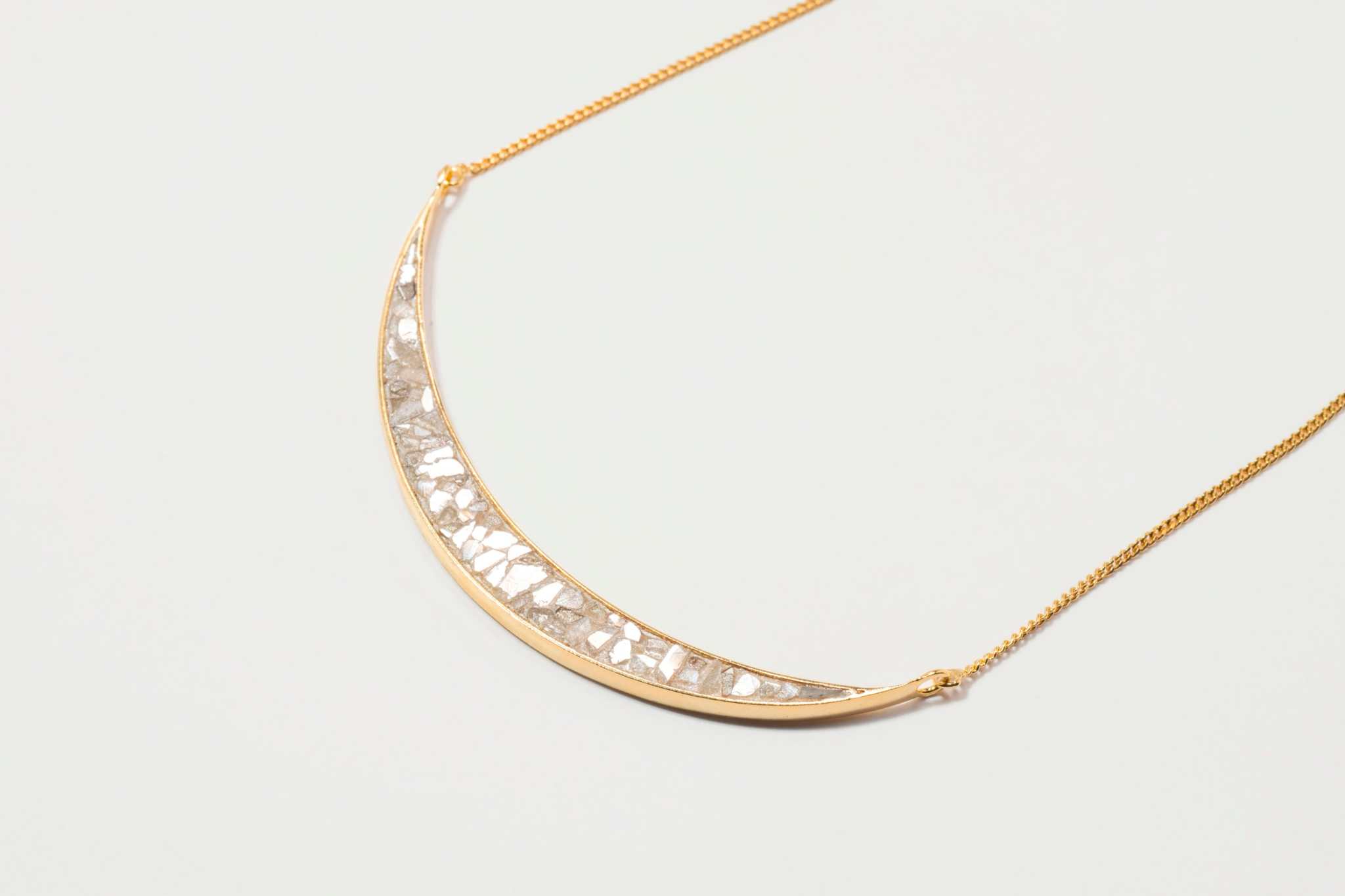 Thane Gold Vermeil Pendant necklace with sliced raw uncut diamonds and 18k gold vermeil crescent design on delicate chain